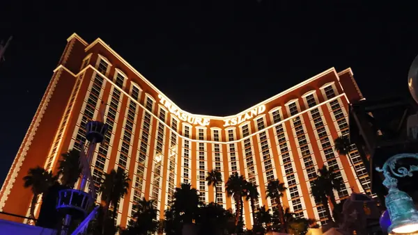 Treasure Island hotel tower lit at night